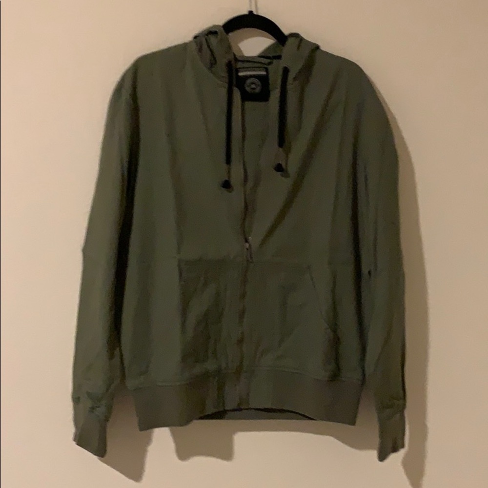 Second image light green jacket.